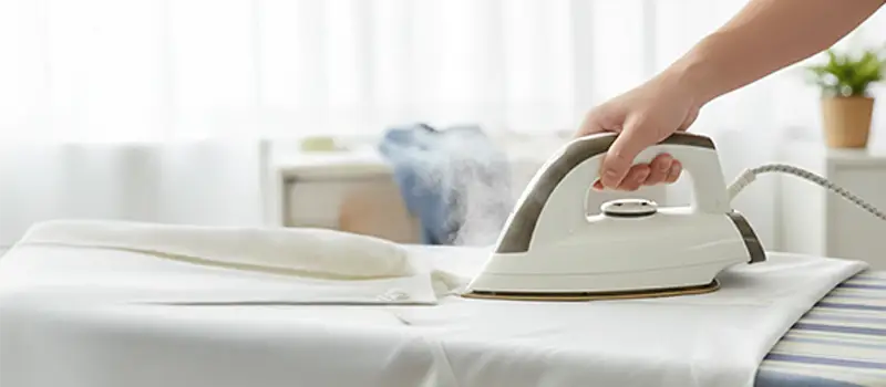 Woman with vacuum cleaner